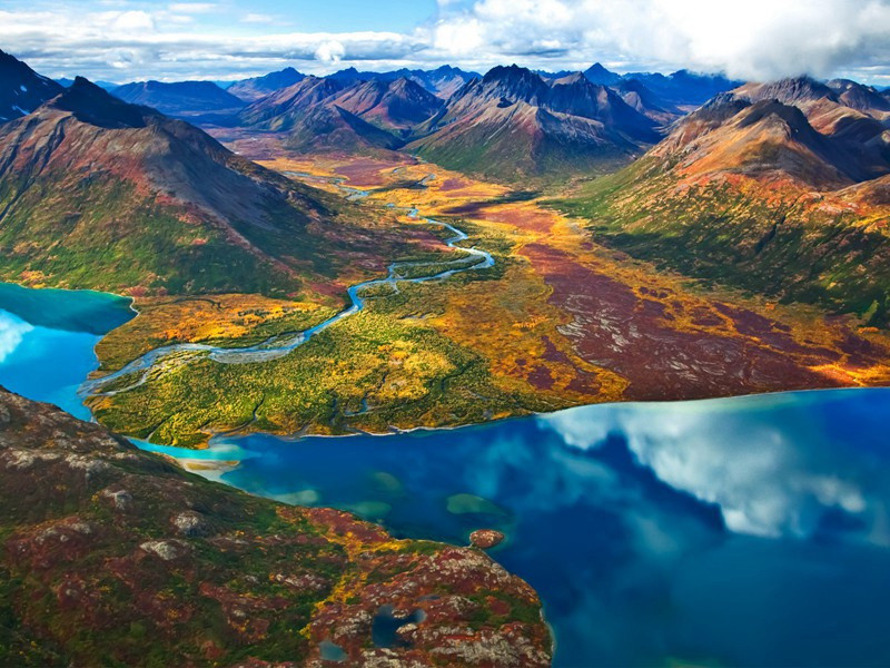 屋上鸠鸣谷雨开,横塘游女荡船回出处意思赏析